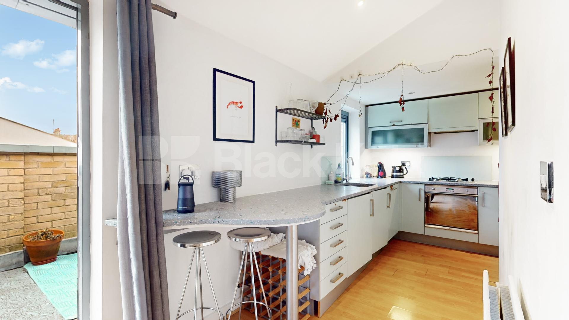 Elegant Two Bedroom Top Floor Residence with Private Balcony Barnsbury Grove, Caledonian Road / Kings Cross